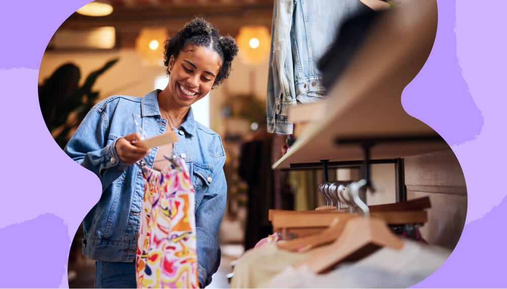 Woman holding a dress while shopping