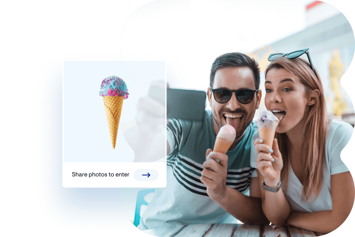 Man and woman taking a selfie and eating ice cream