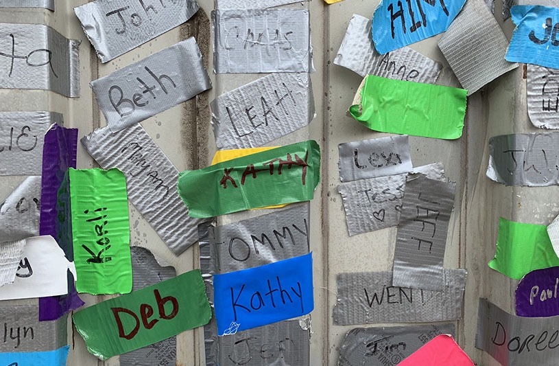 Name tags on the trailer door at Hartford Habitat.