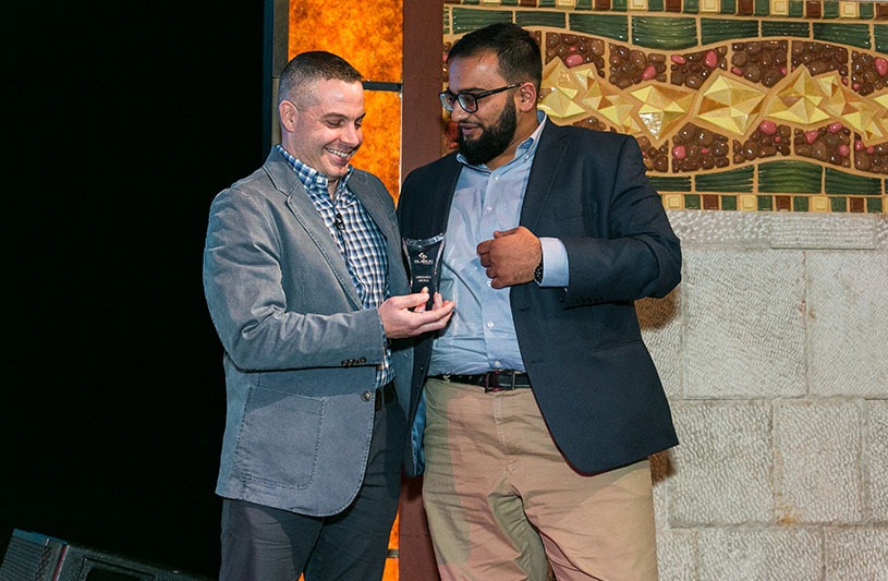 Muhammad Khan wins the 2018 Unsung Hero award at Clarus.