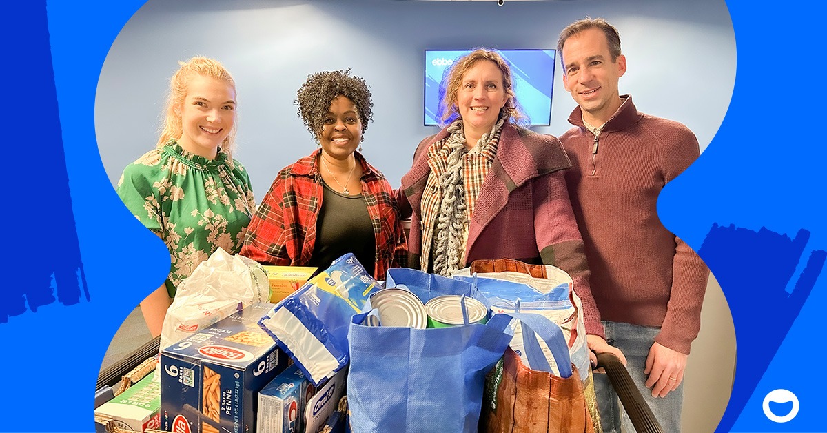 ebbo team members in Connecticut collecting non-perishable food items for Hands on Hartford charity.