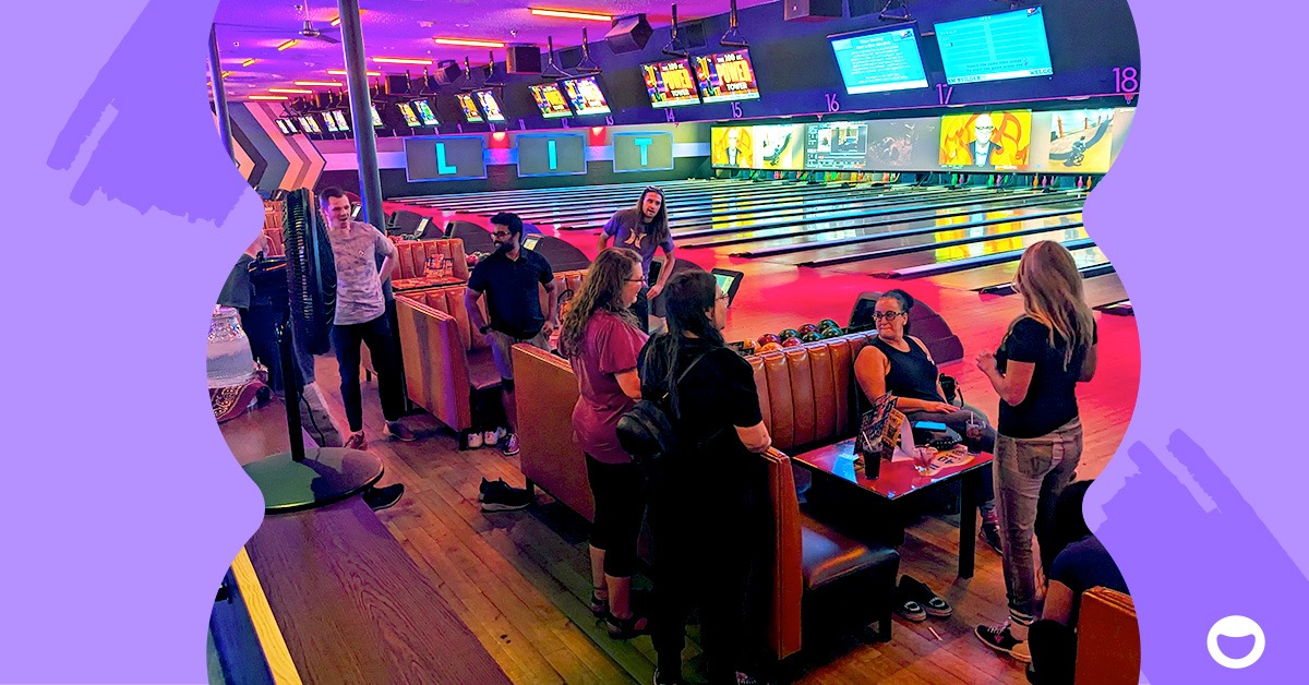 ebbo team members having fun at a bowling alley.